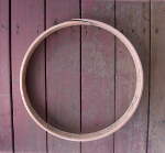 Tar with a torn goat skin drum head.